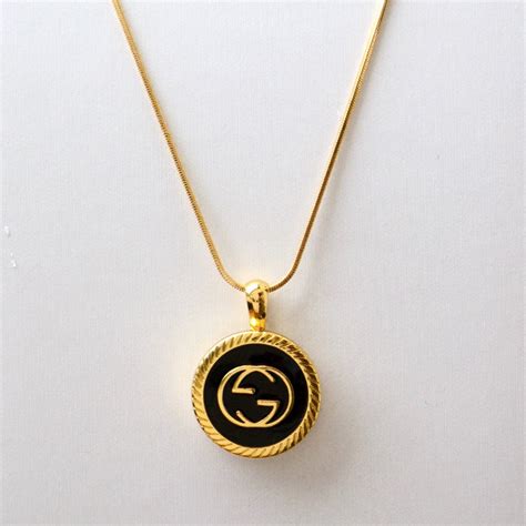 repurposed gucci button necklace